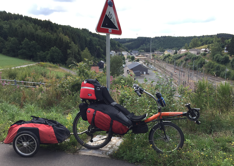 My recumbent bike in front of a station